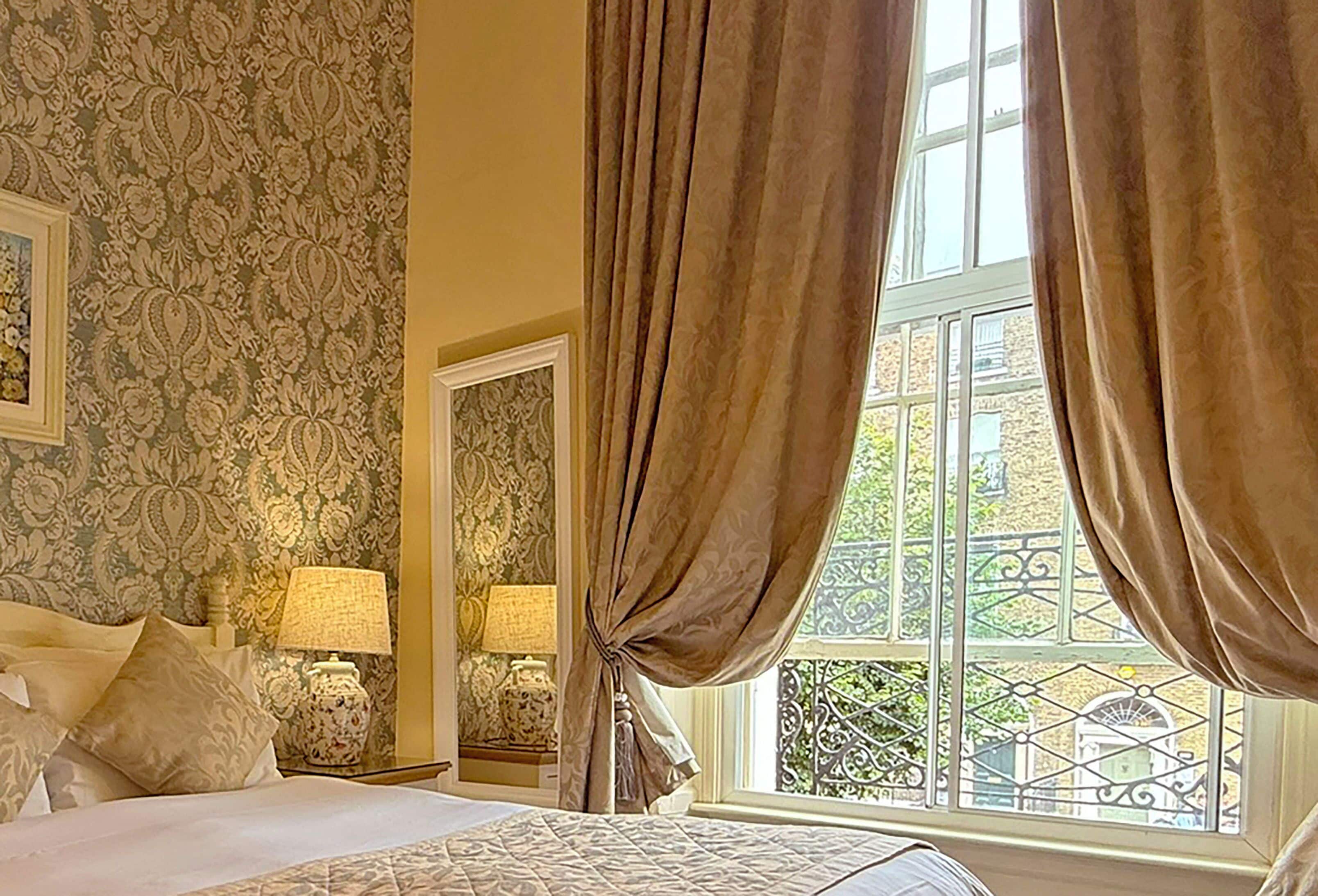 Down comforters, desk, blackout drapes, iron/ironing board