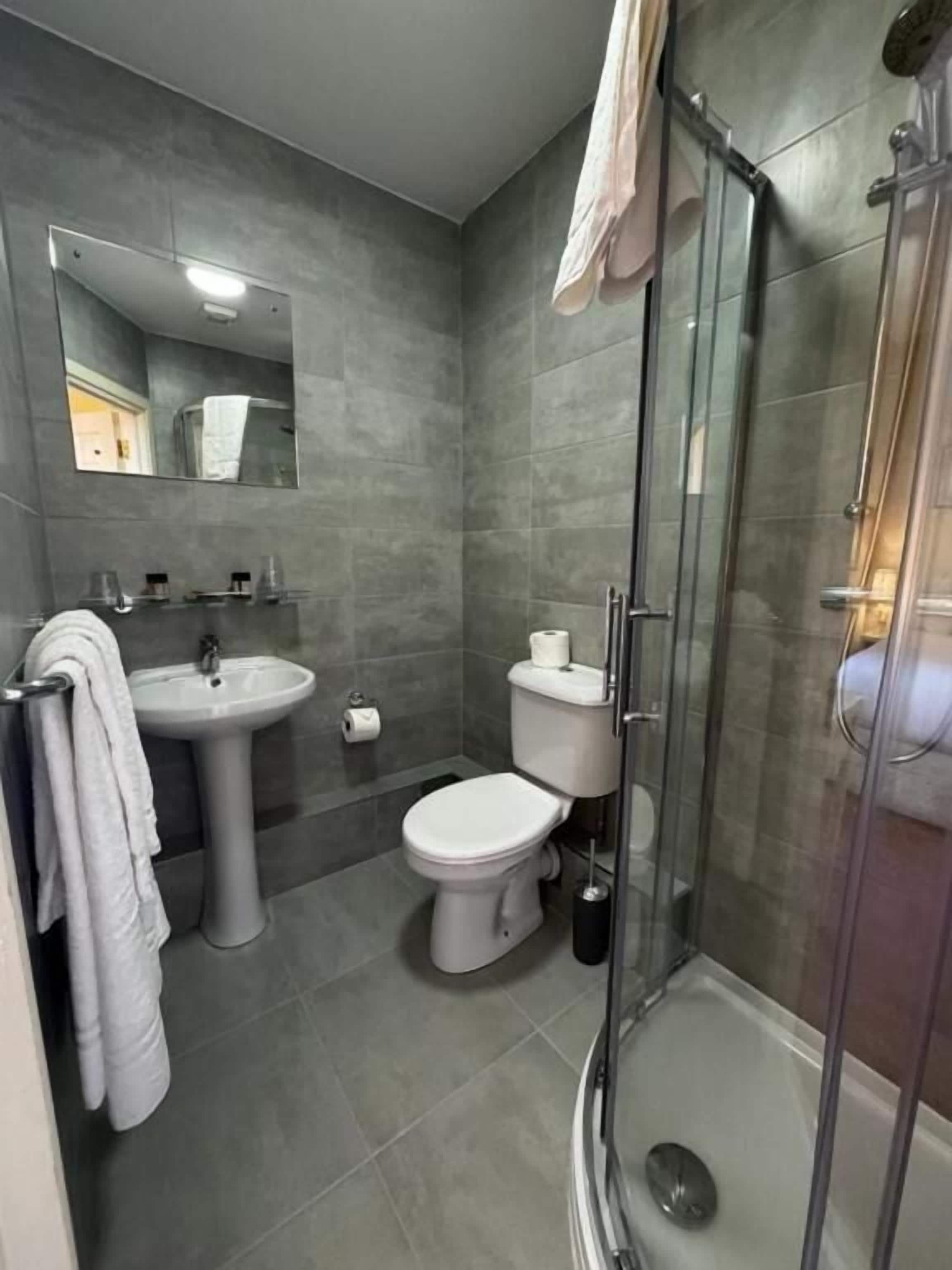 Shower, free toiletries, hair dryer, towels