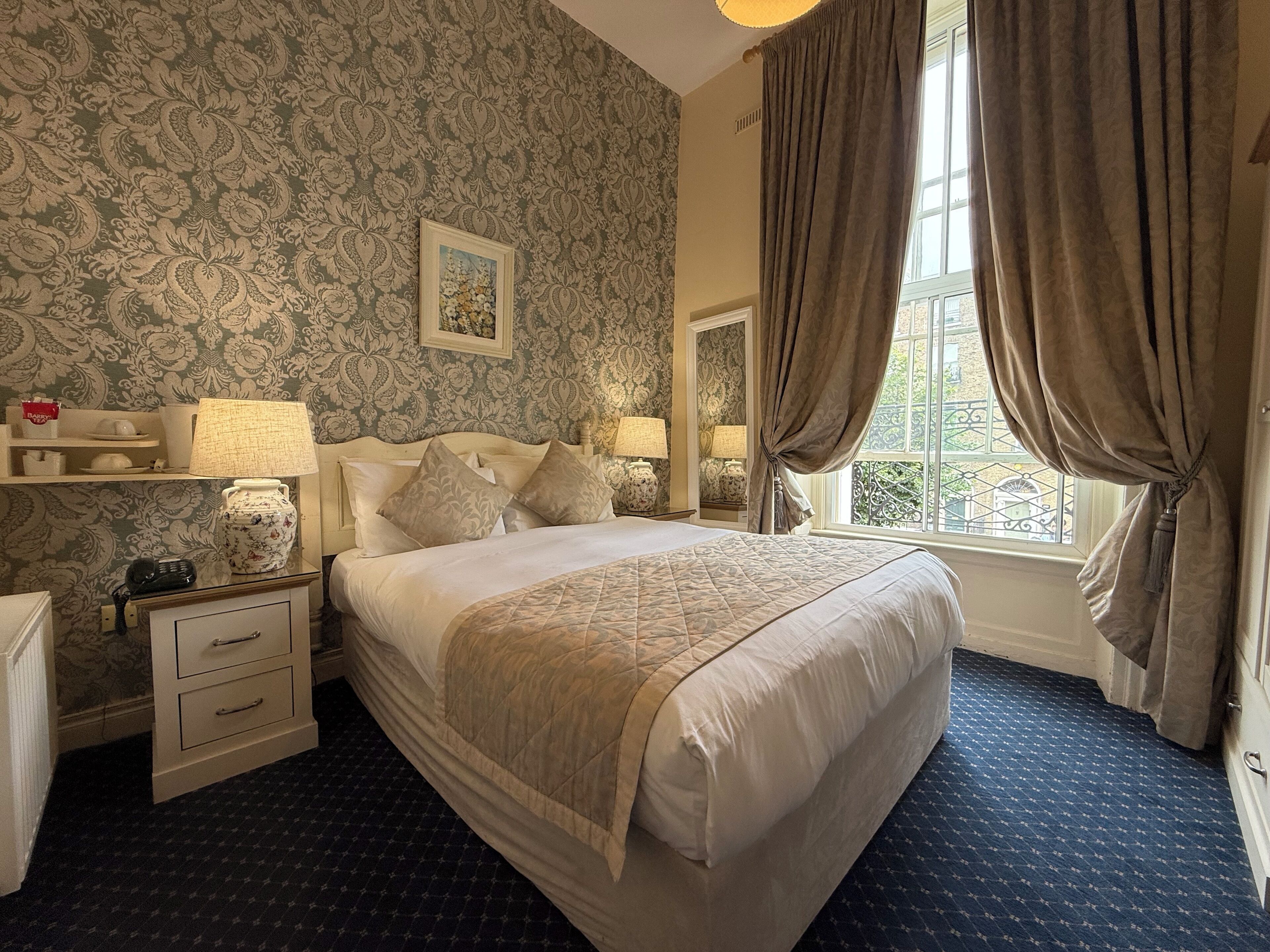 Down duvets, desk, blackout curtains, iron/ironing board