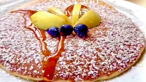 A dessert with fruit and syrup on a plate. - Baggot Court Townhouse (Dublin)