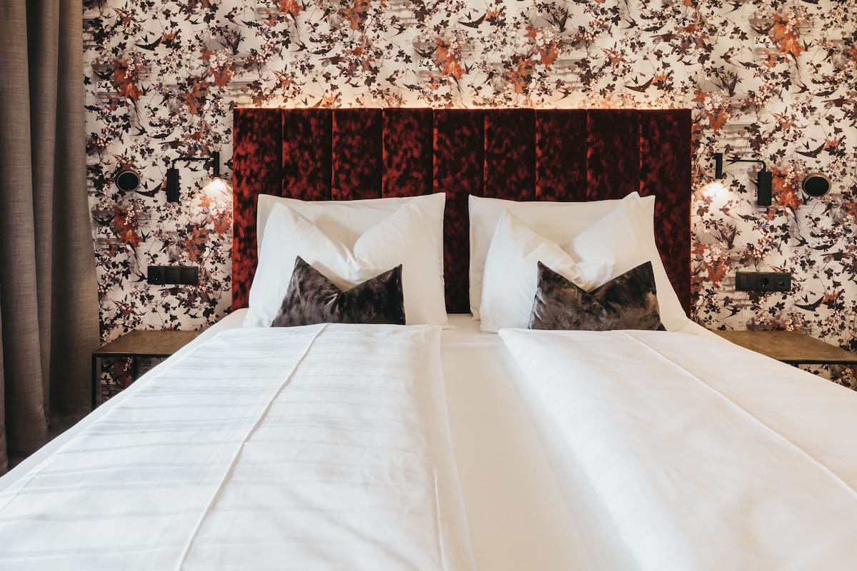Elite Double Room (Cinema) | 1 bedroom, down duvets, minibar, in-room safe