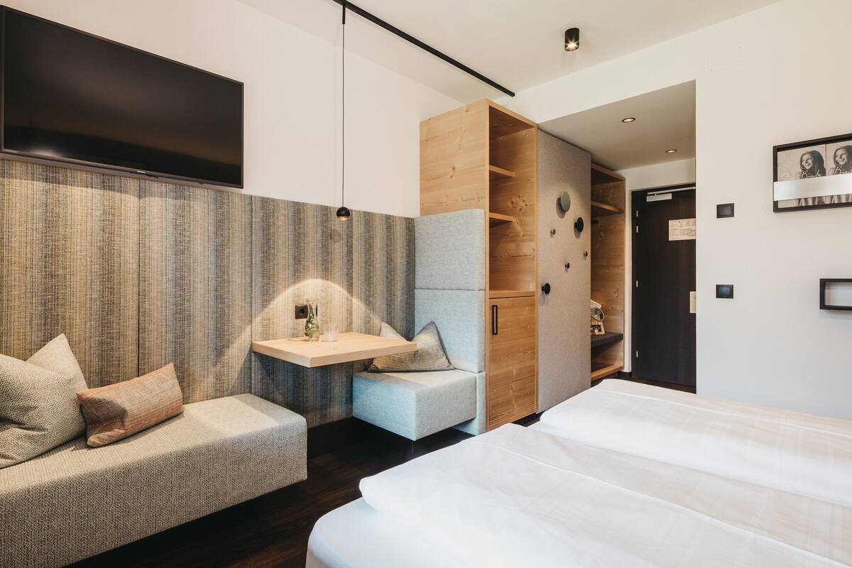 business double room (rudolf) | living area | 20-inch flat-screen tv with satellite channels, tv, toys