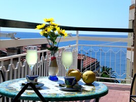Comfort Condo, 1 Bedroom, Sea View | In-room safe, individually decorated, individually furnished, desk
