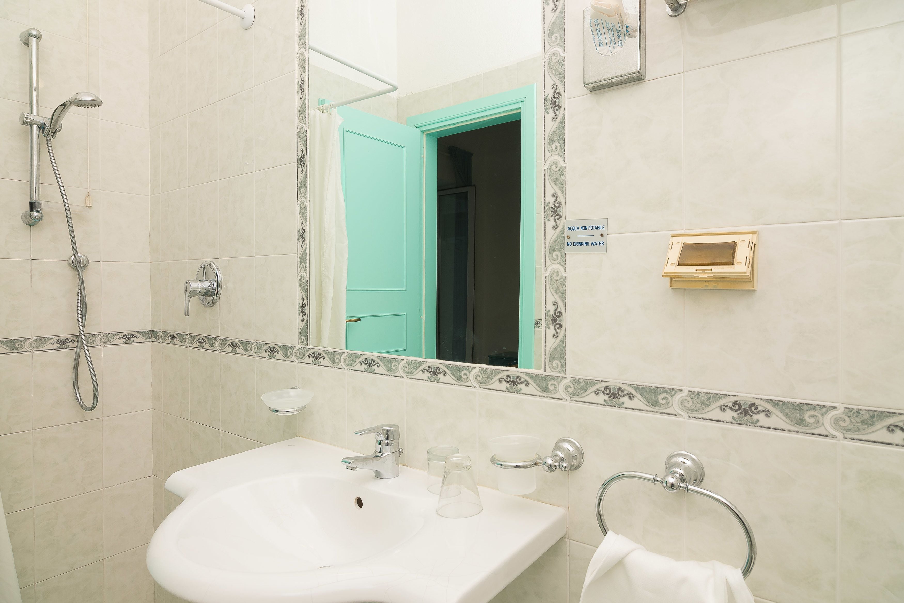 rainfall showerhead, free toiletries, hair dryer, slippers