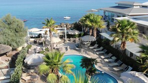 Outdoor pool, pool umbrellas, sun loungers