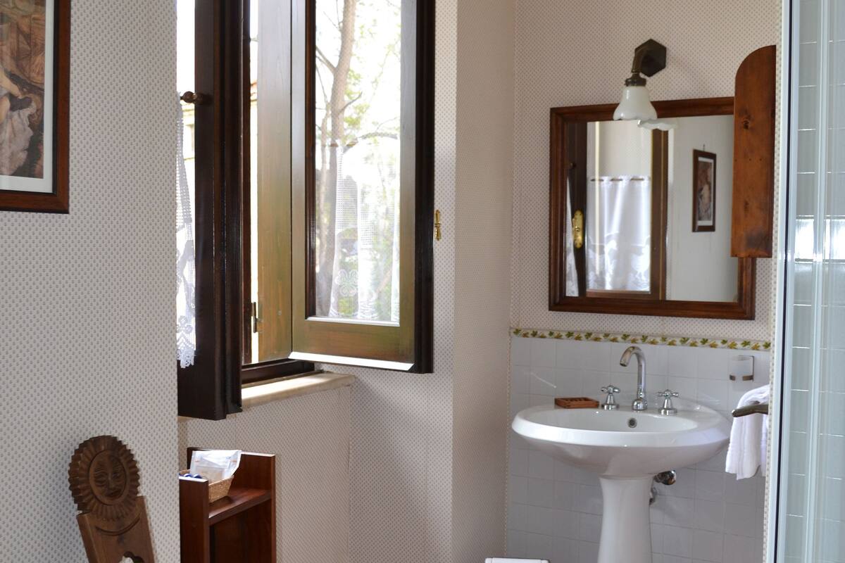 family room for 2 adults and 2 children up to 13 years old | bathroom | shower, free toiletries, hair dryer, bidet