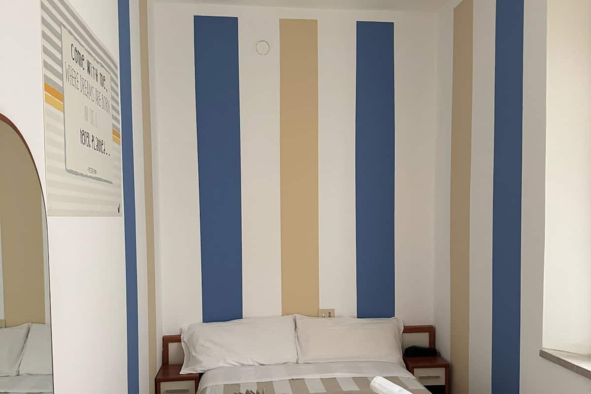 Family Room, Private Bathroom | In-room safe, desk, free WiFi, bed sheets
