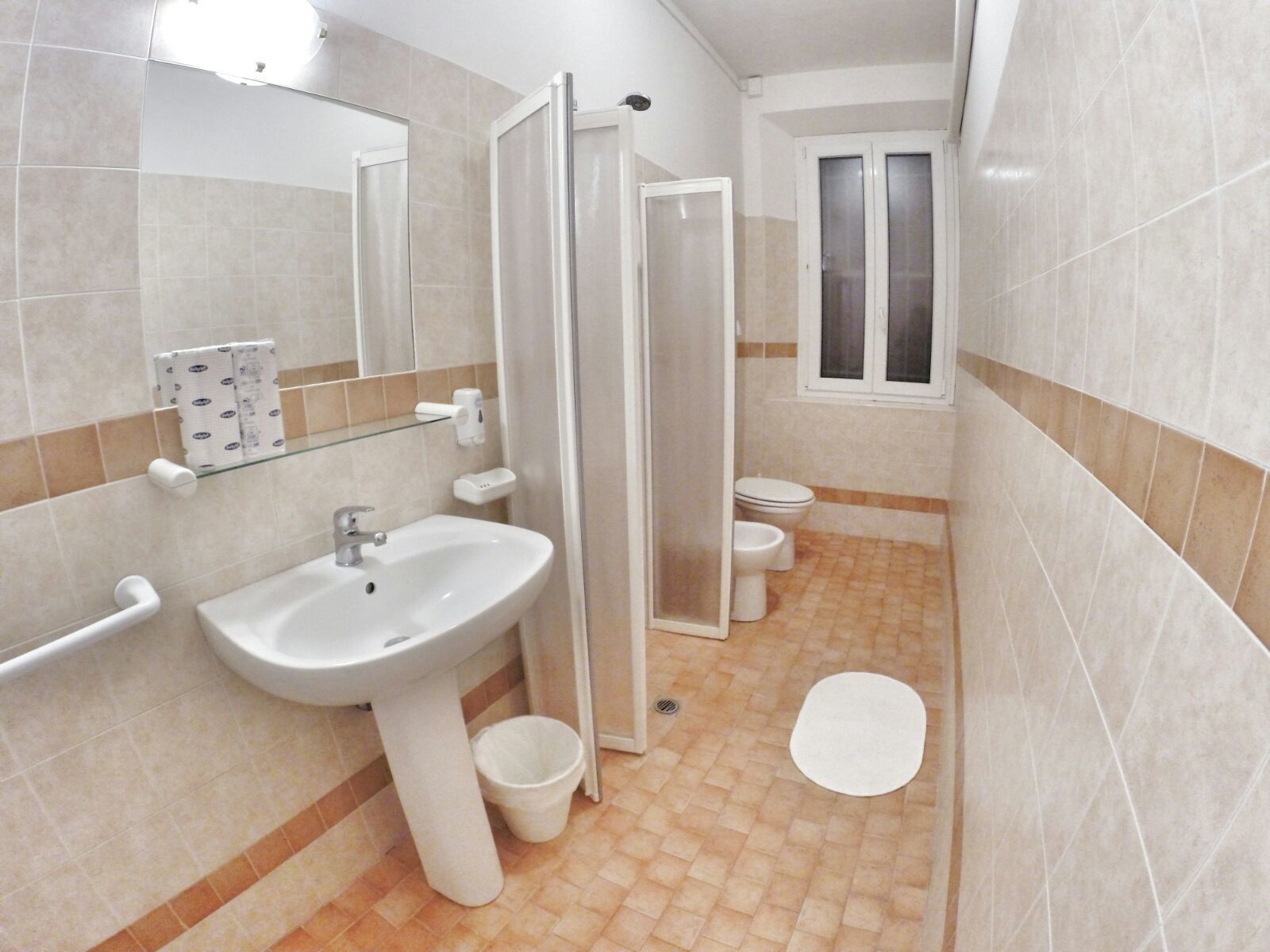 family room, private bathroom | bathroom | shower, free toiletries, hair dryer, towels