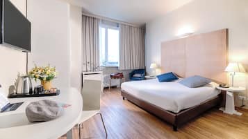 Premium bedding, down comforters, in-room safe, desk