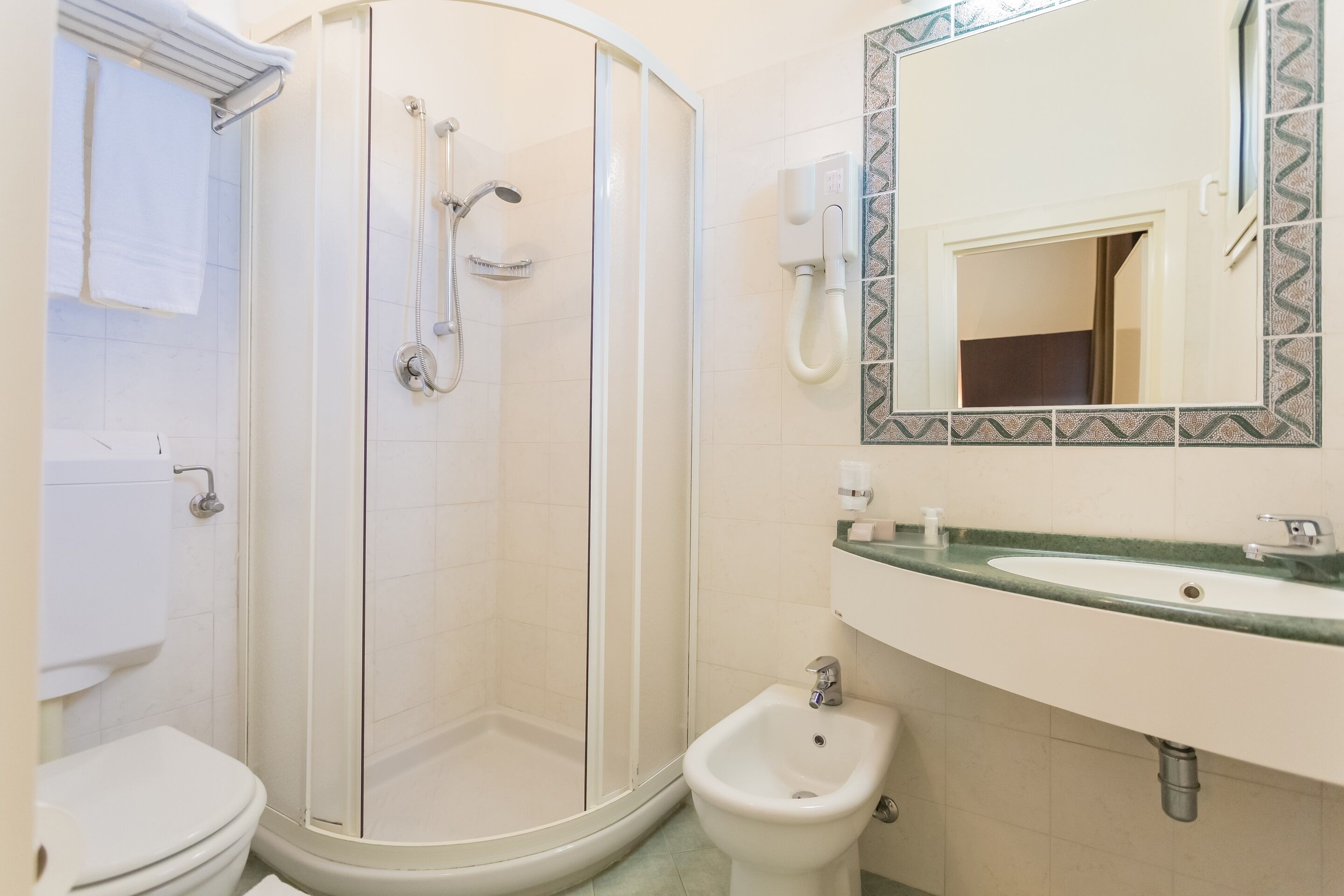 standard triple room | bathroom | shower, free toiletries, hair dryer, towels