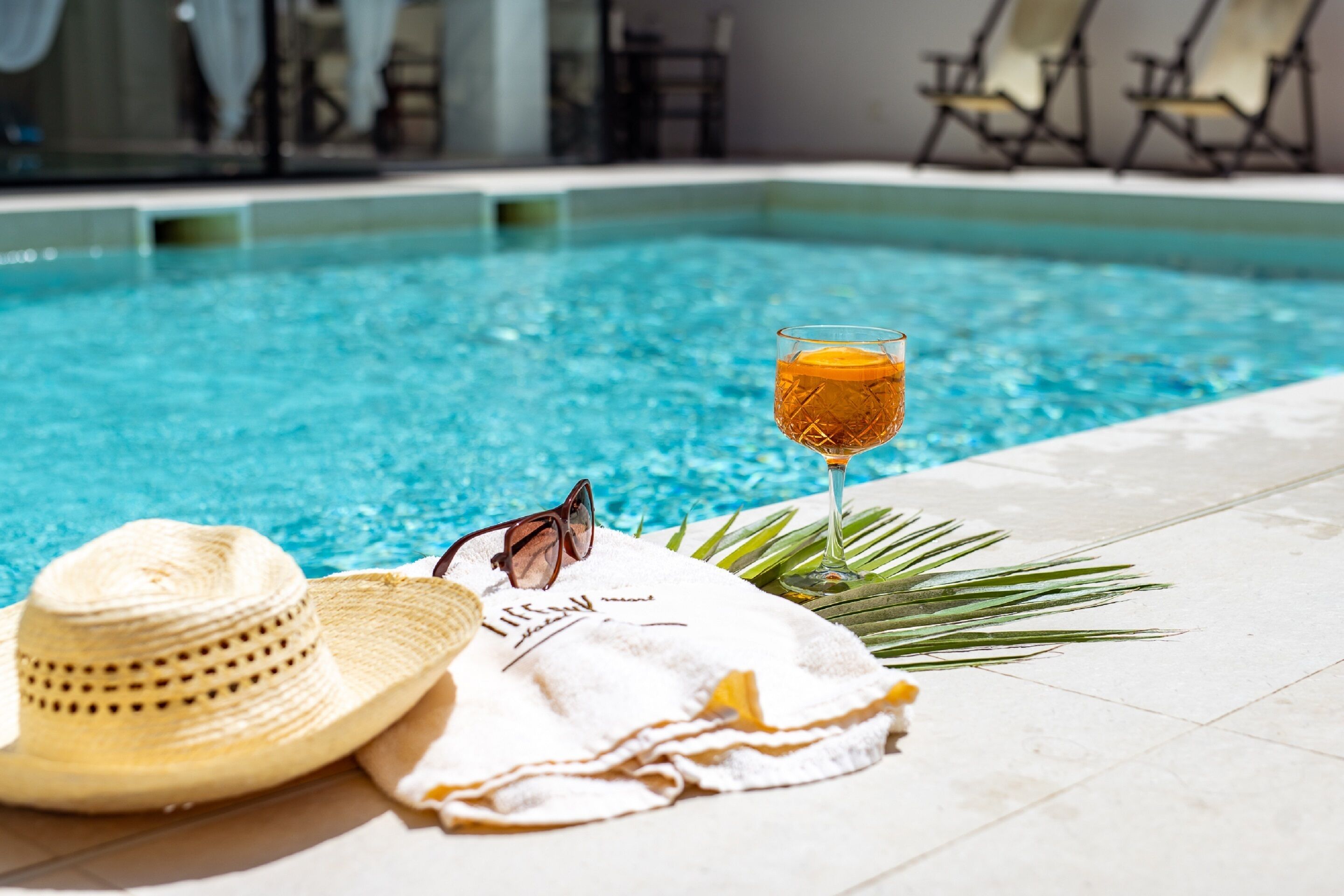 Outdoor pool, a rooftop pool, open 10 AM to 7 PM, sun loungers