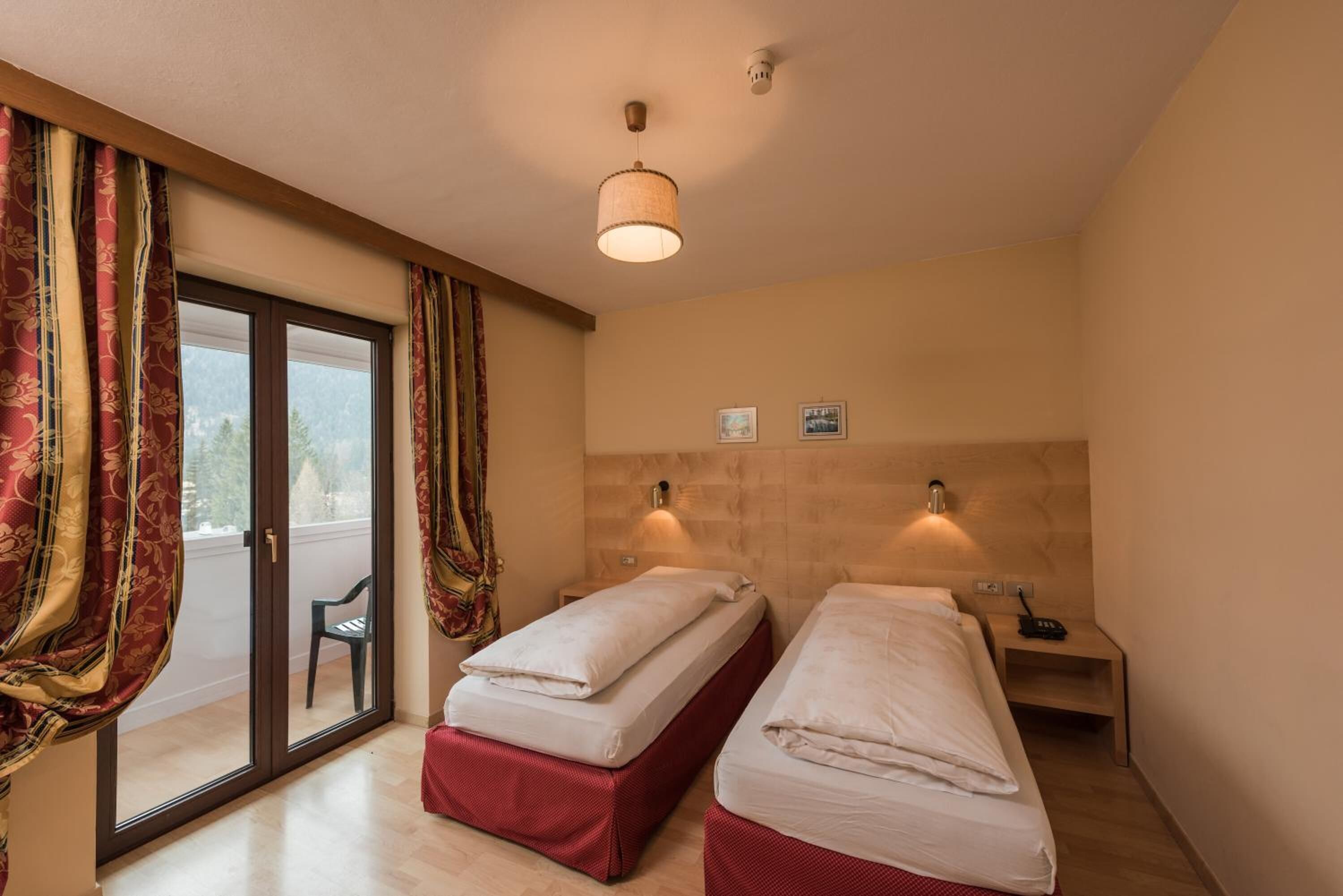 hypo-allergenic bedding, down duvets, in-room safe, desk