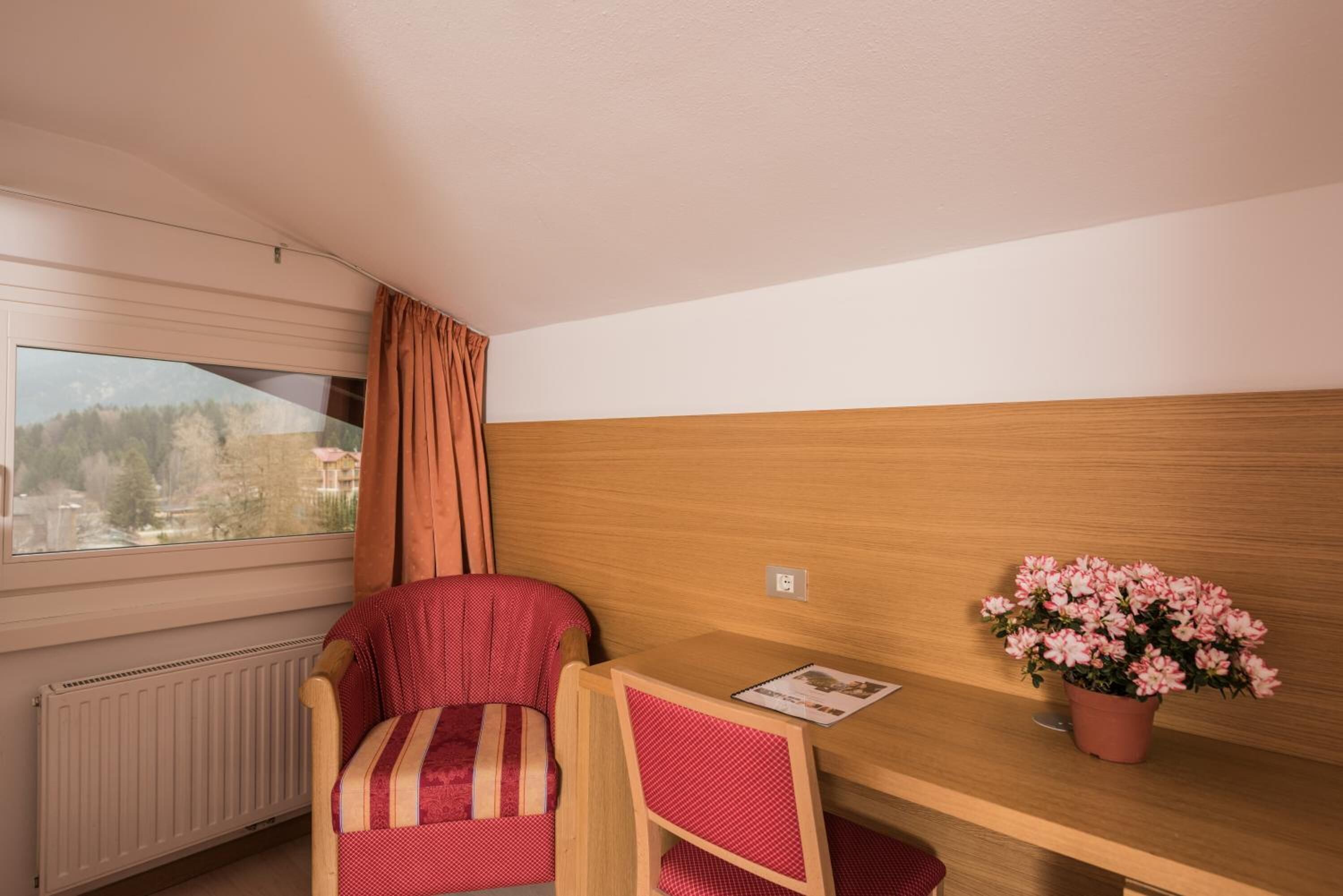 hypo-allergenic bedding, down duvets, in-room safe, desk