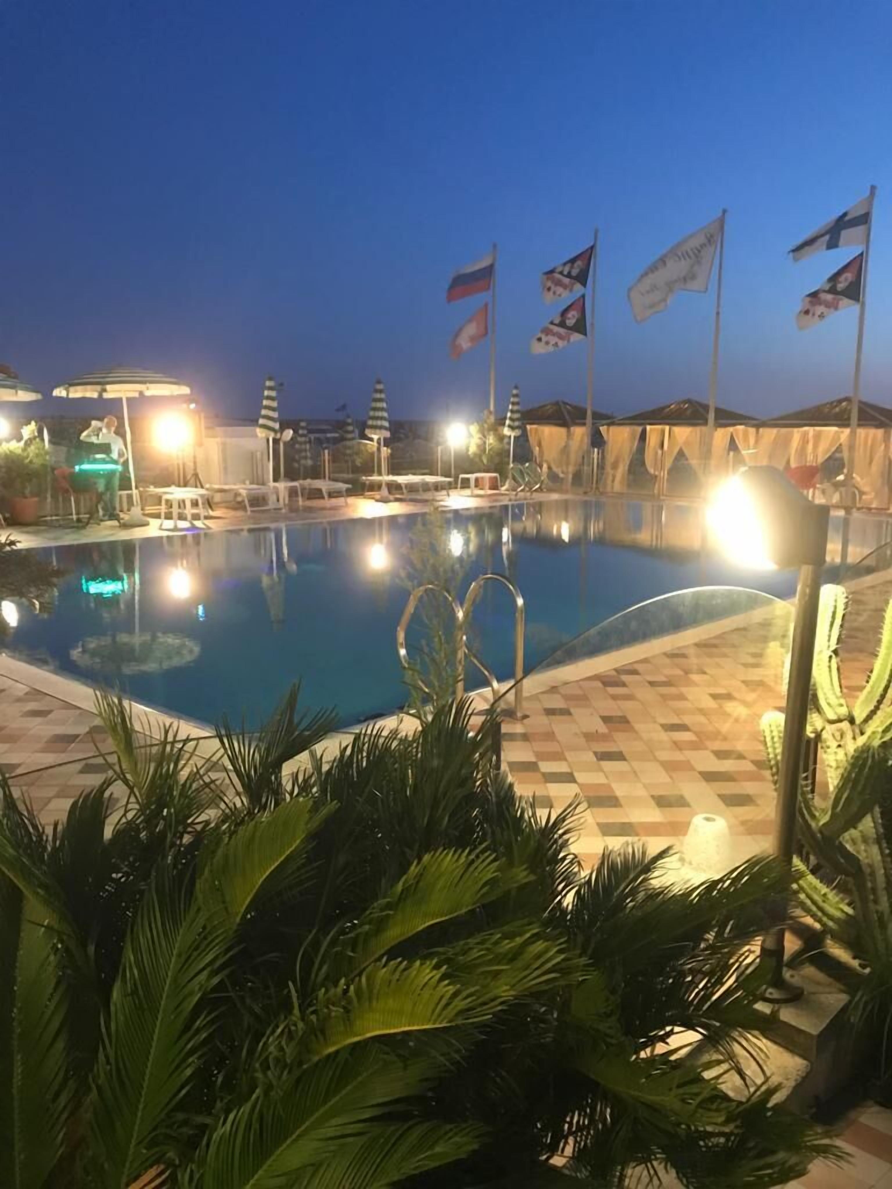 private beach nearby, black sand, beach bar