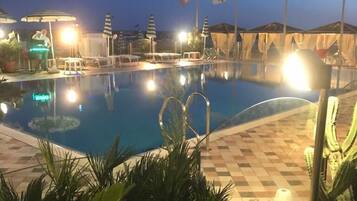 Private beach nearby, black sand, beach bar