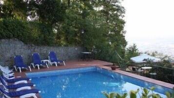 Outdoor pool, sun loungers