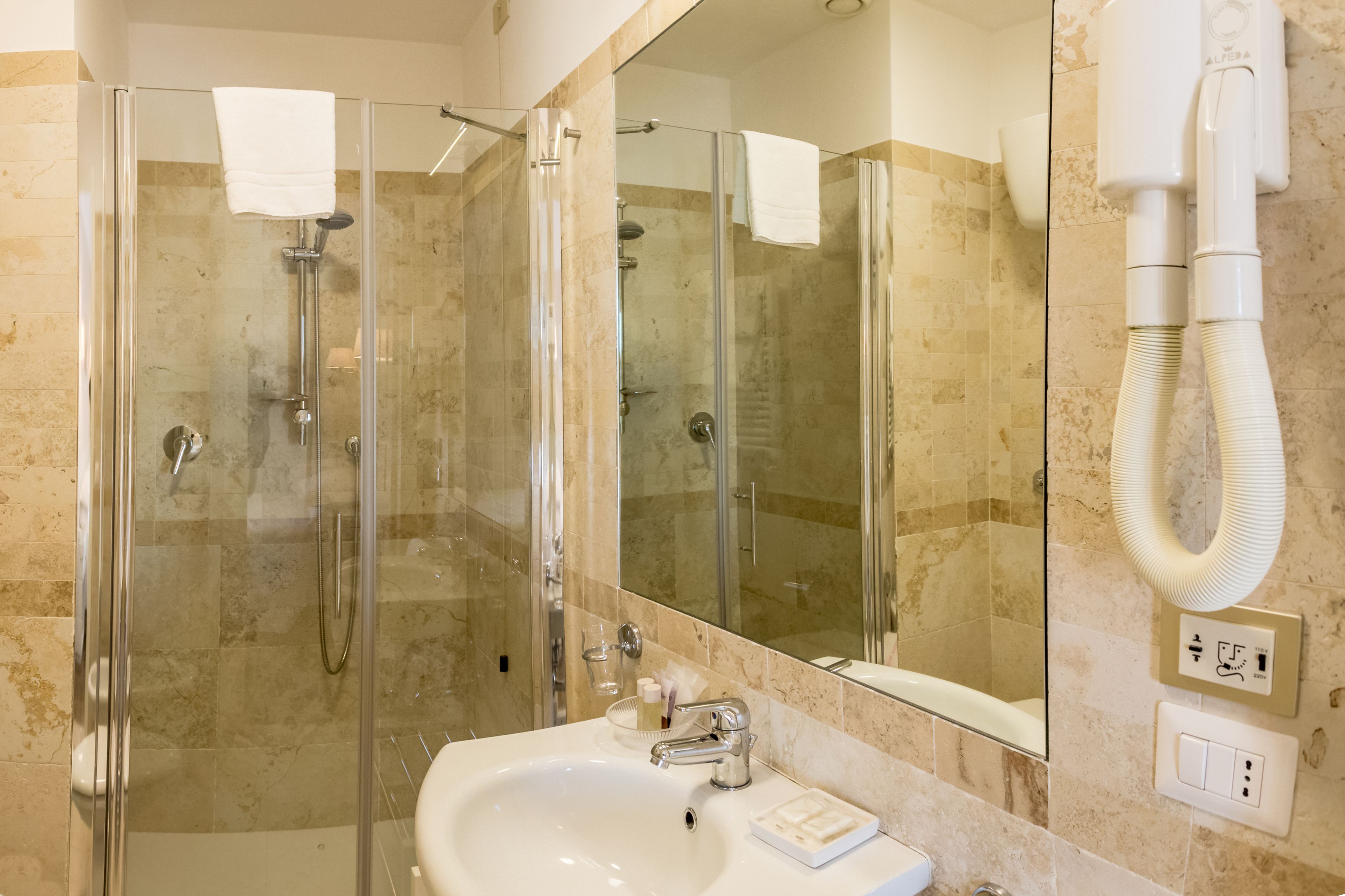 shower, free toiletries, hair dryer, bidet