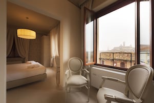 Junior Suite, City View | Down comforters, minibar, in-room safe, desk