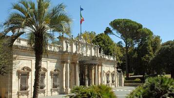 A historic building with classical architecture, featuring columns and ornate details.