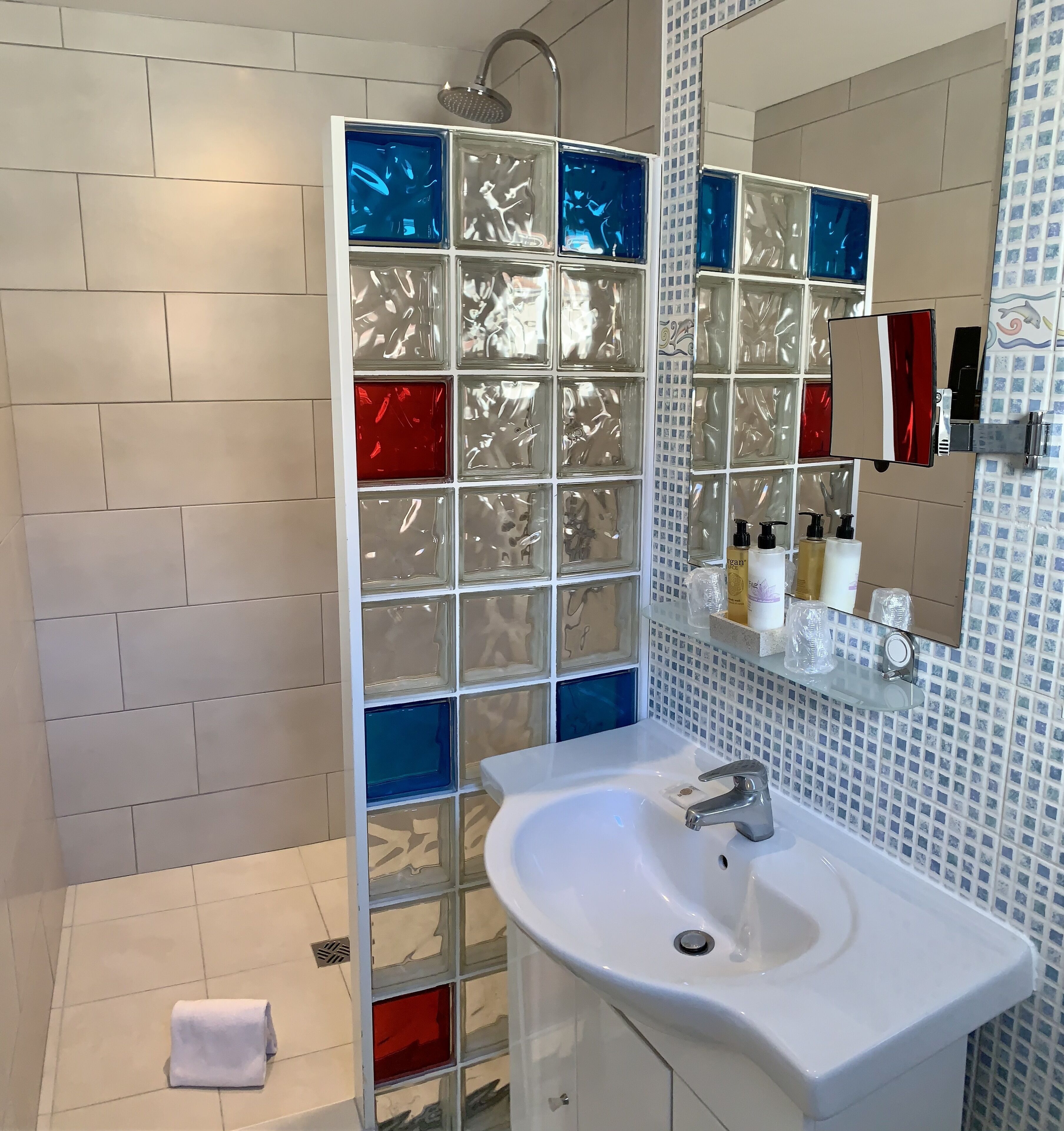 shower, free toiletries, hair dryer, slippers