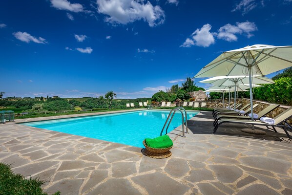 3 outdoor pools, pool umbrellas, pool loungers
