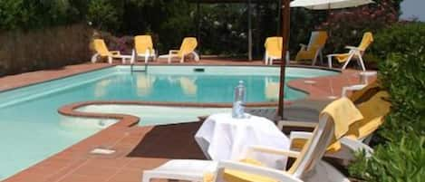 Outdoor pool, pool umbrellas, pool loungers