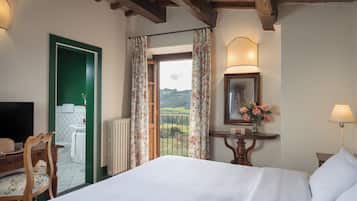 Habitación superior | Colchones Select Comfort, minibar, caja fuerte y mobiliario individual