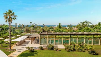 Indoor pool, open 10:00 AM to 8:00 PM, pool umbrellas, pool loungers