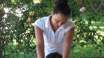 Guests can enjoy a rejuvenating massage in a serene garden setting.