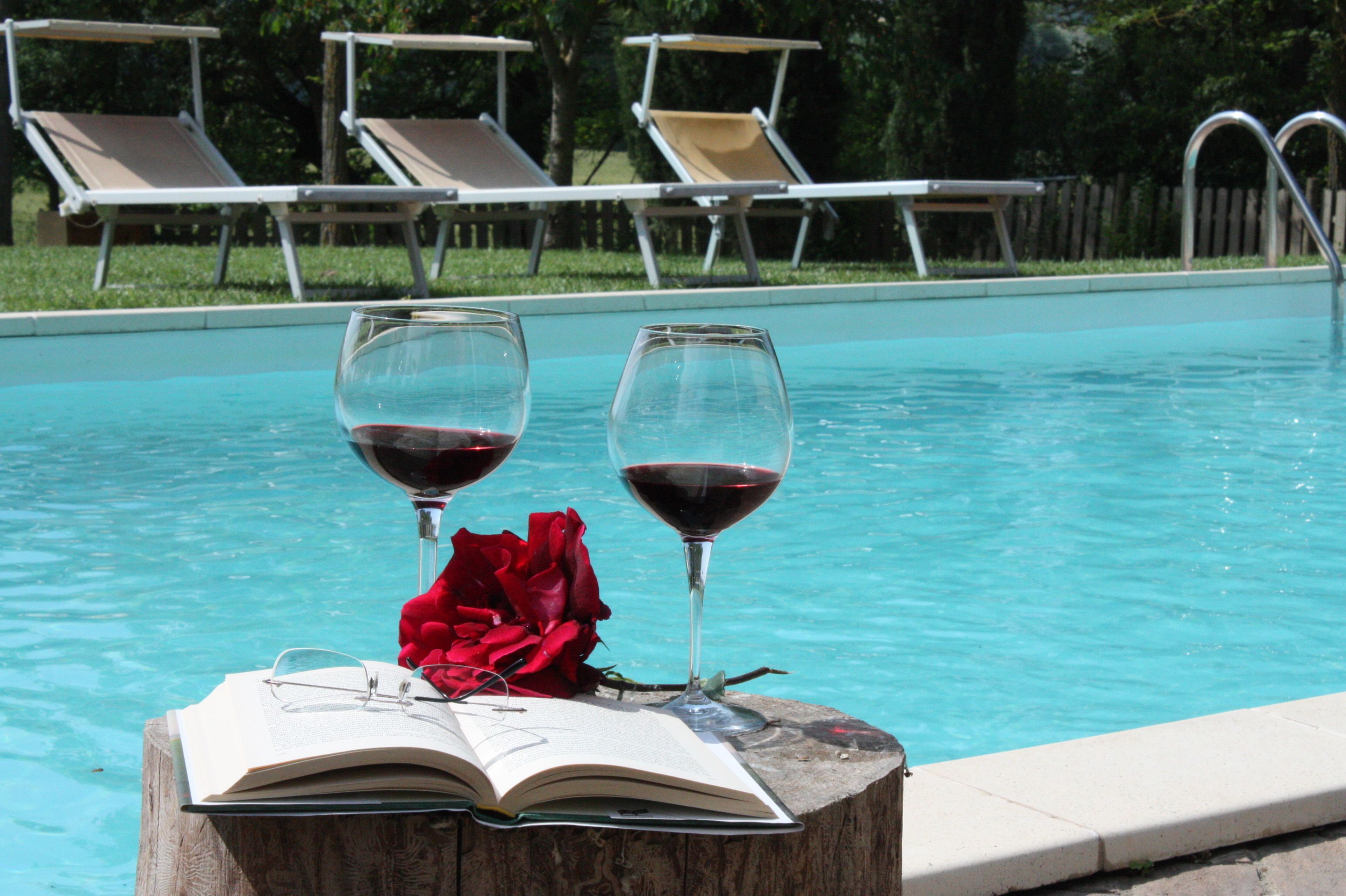 Outdoor pool, pool umbrellas, sun loungers