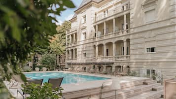 Seasonal outdoor pool, open 8 AM to 8 PM, pool umbrellas, sun loungers