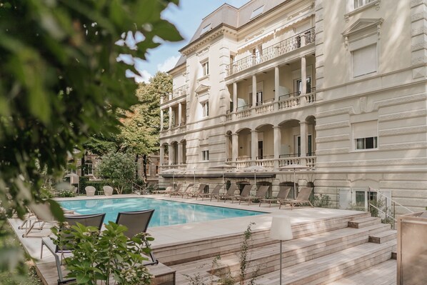 Seasonal outdoor pool, open 8 AM to 8 PM, pool umbrellas, sun loungers