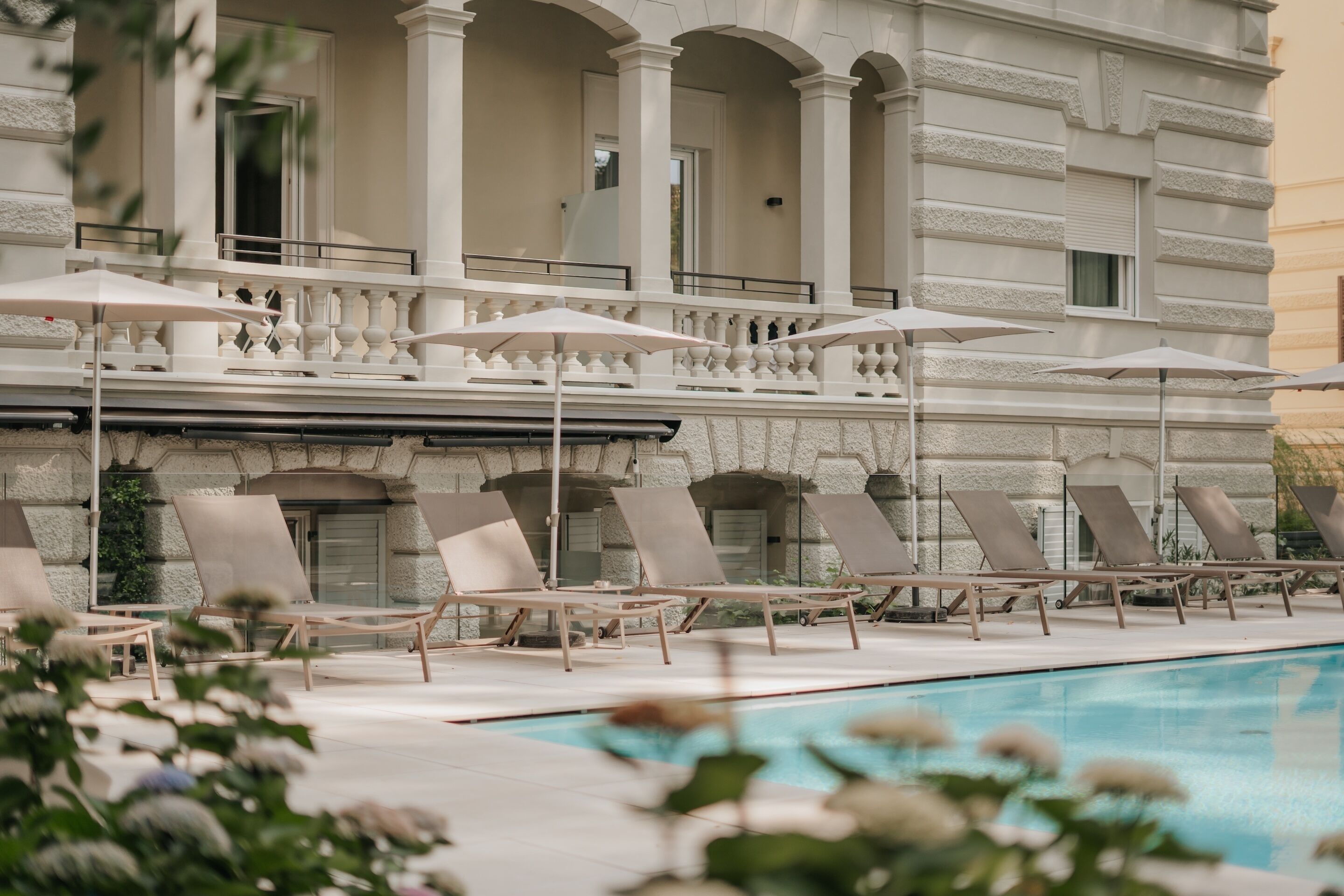 Seasonal outdoor pool, open 8 AM to 8 PM, pool umbrellas, sun loungers