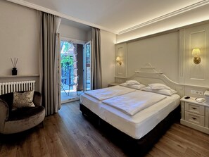 Deluxe Room, Pool Access, Ground Floor | Premium bedding, down comforters, memory foam beds, minibar - Windsor Merano Hotel & Suites (Merano)