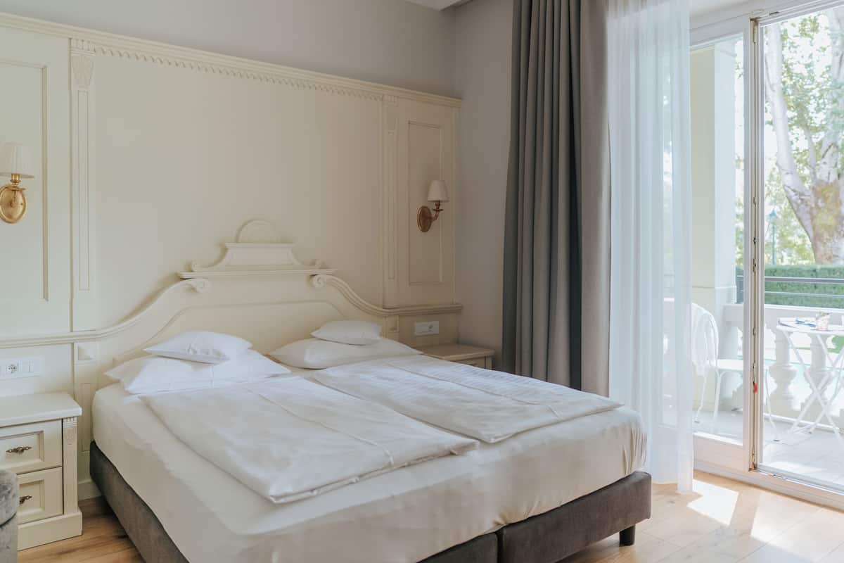 Premium bedding, down duvets, memory-foam beds, minibar