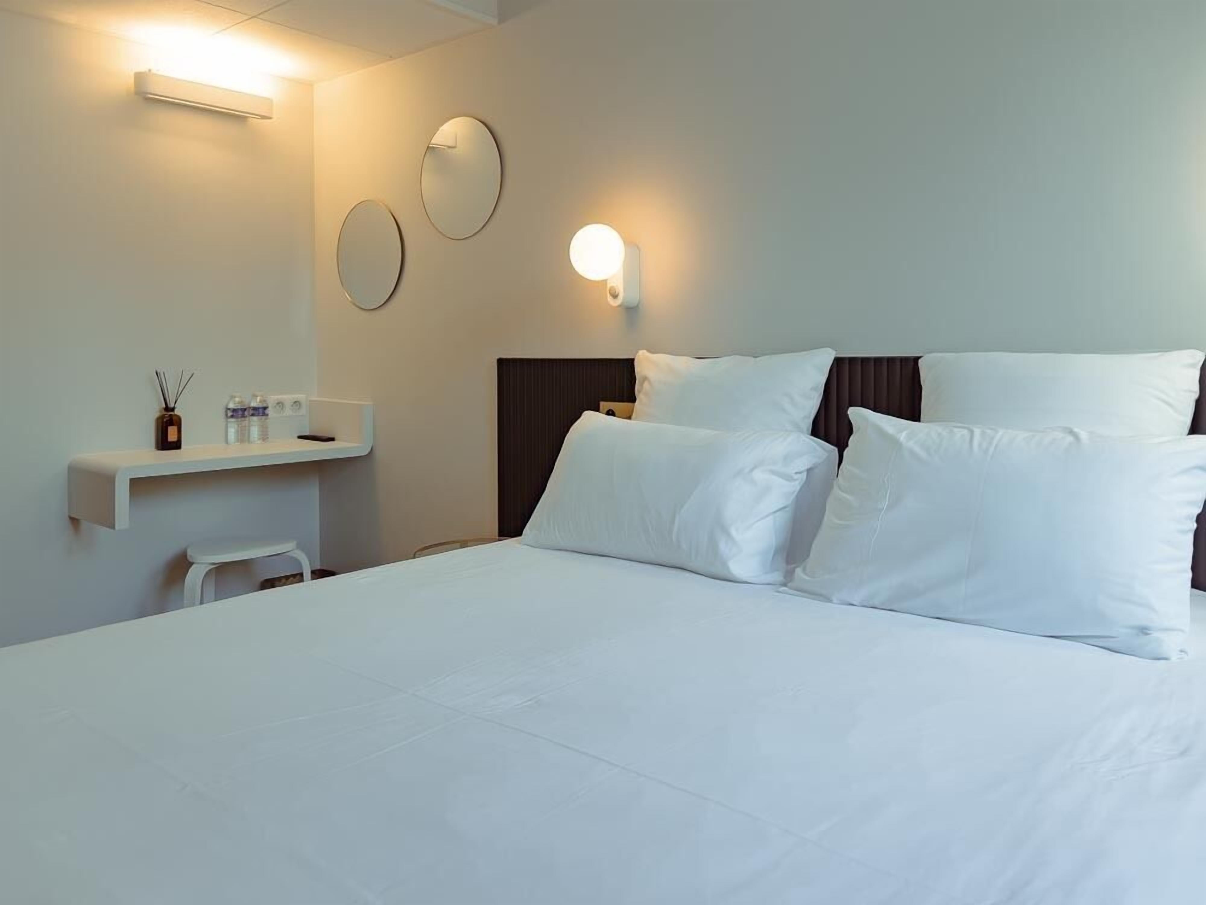 superior room | premium bedding, desk, soundproofing, free wifi