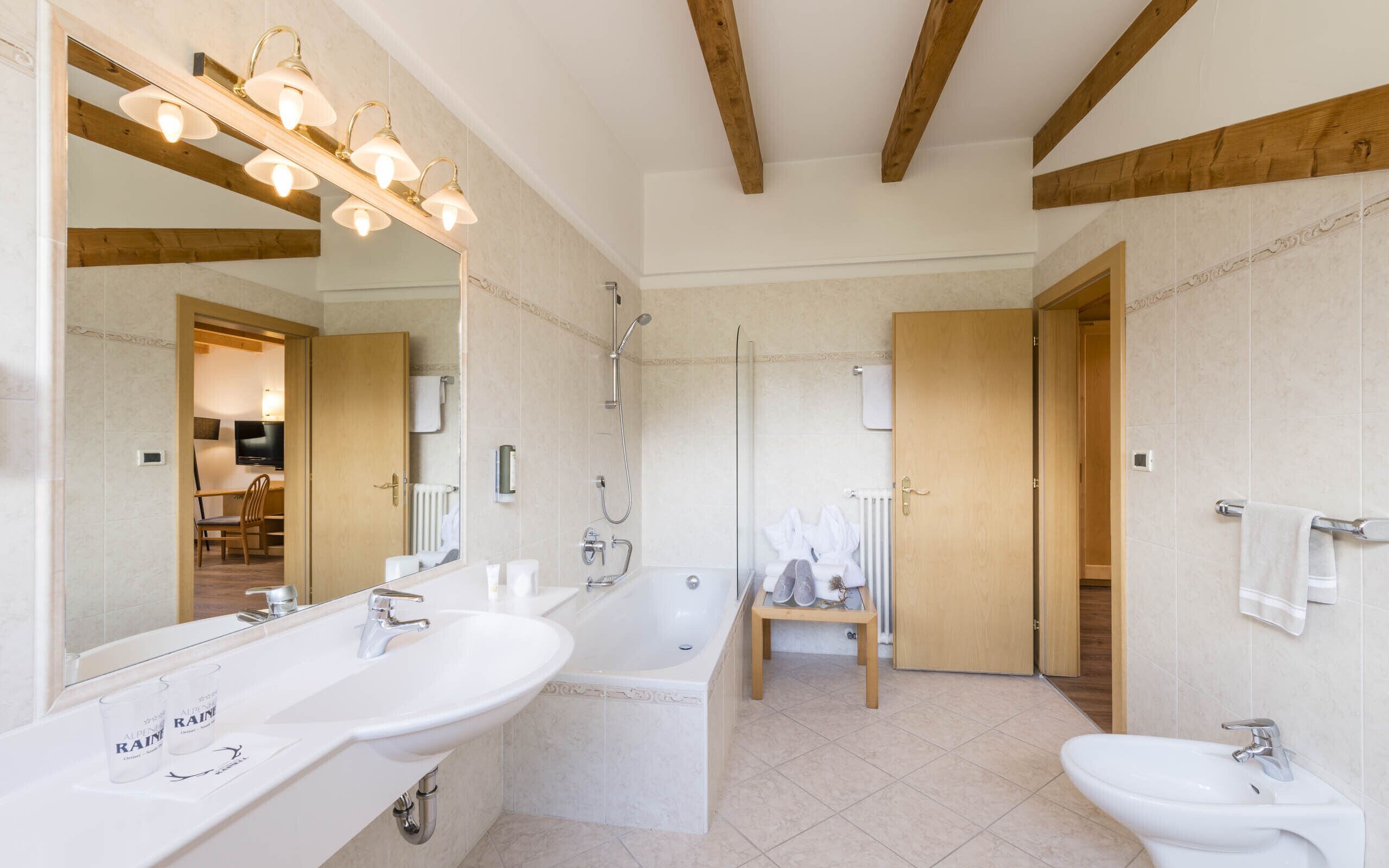 junior suite | bathroom | rainfall showerhead, free toiletries, hair dryer, bathrobes