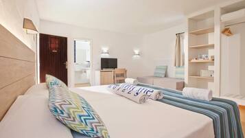 Desk, blackout drapes, bed sheets