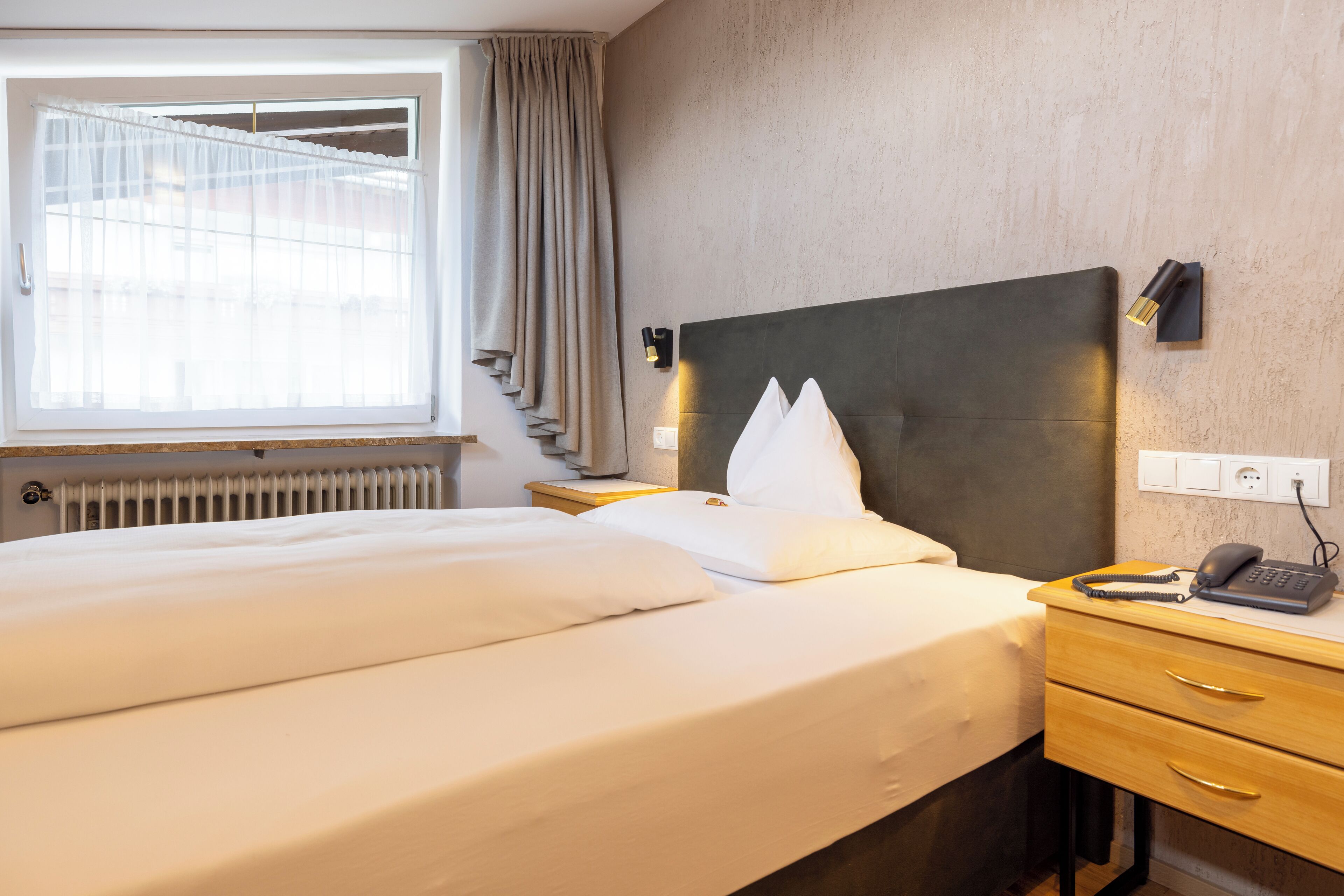 standard single room | pillow-top beds, in-room safe, blackout curtains, soundproofing