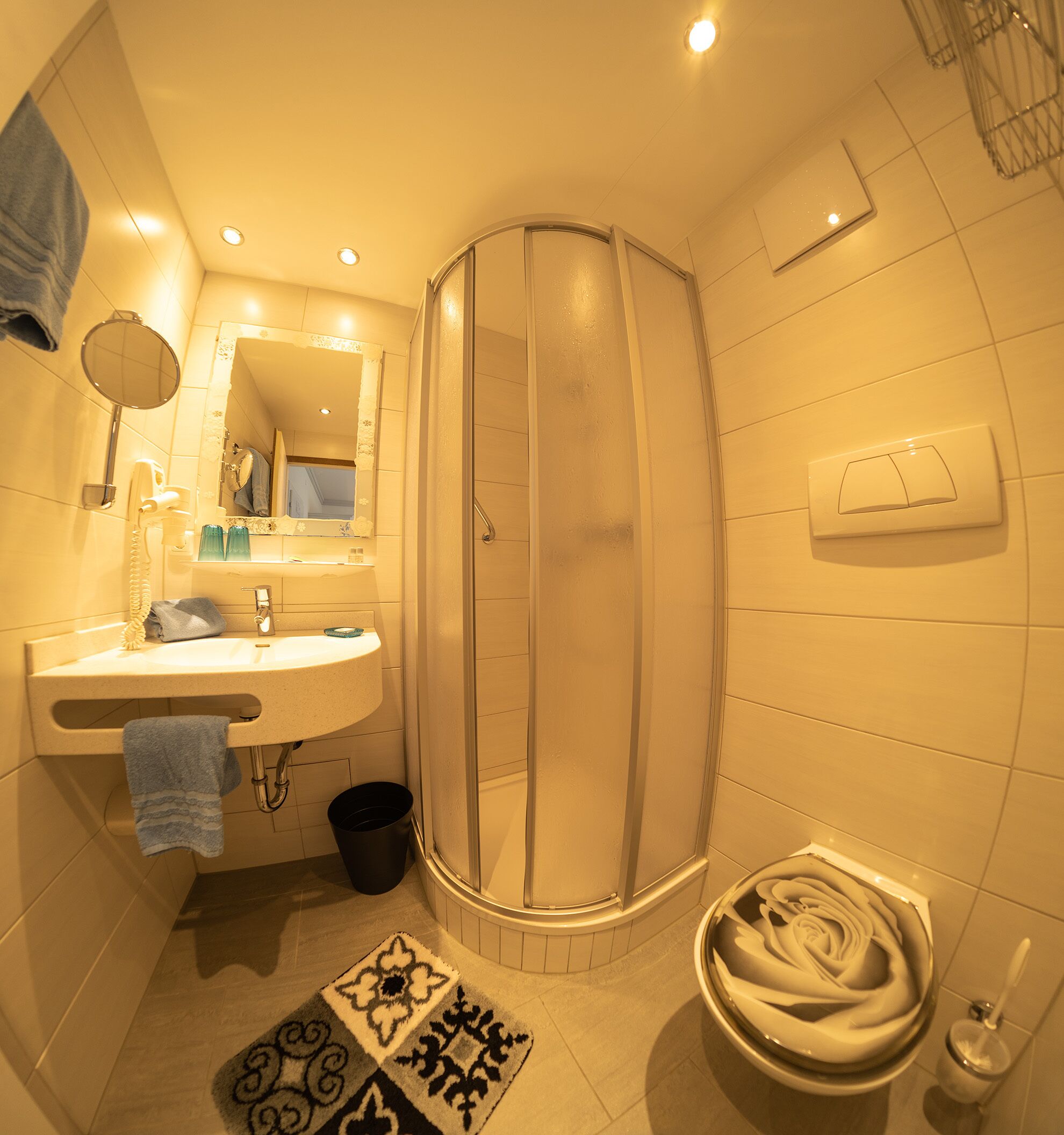 shower, free toiletries, hair dryer, towels