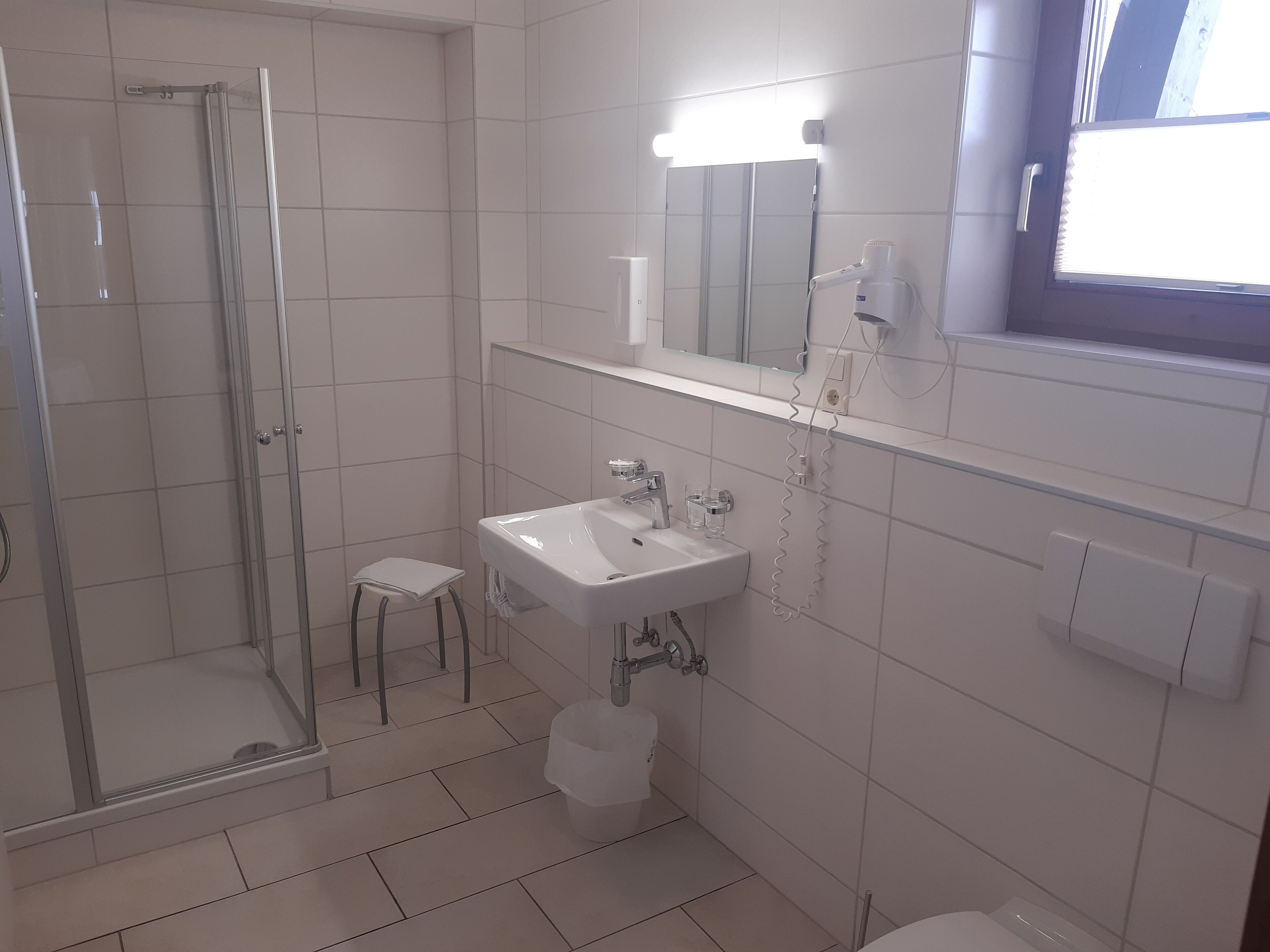 comfort double room, balcony, mountain view | bathroom | hair dryer, towels