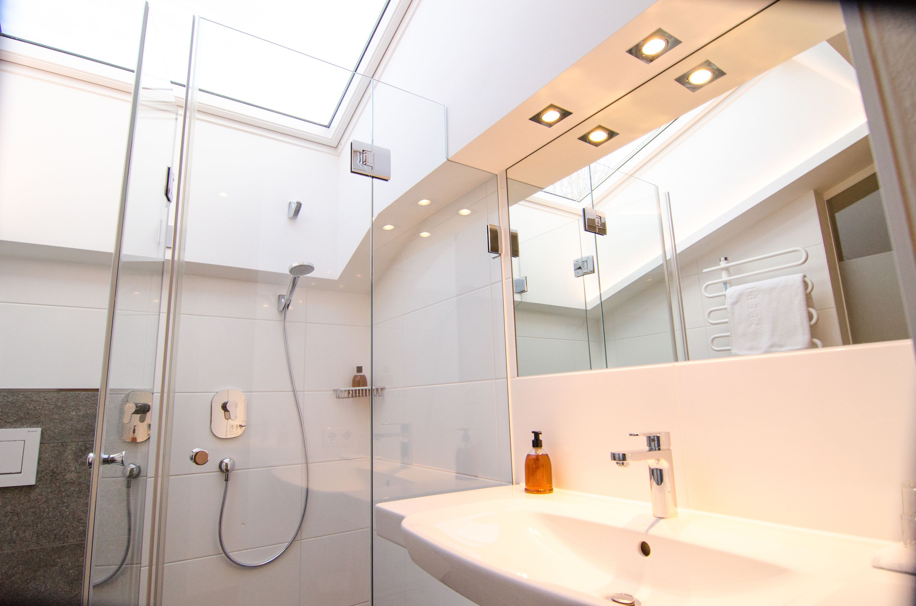 hair dryer, bathrobes, towels