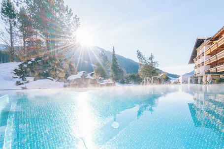 Indoor pool, seasonal outdoor pool, pool umbrellas, sun loungers