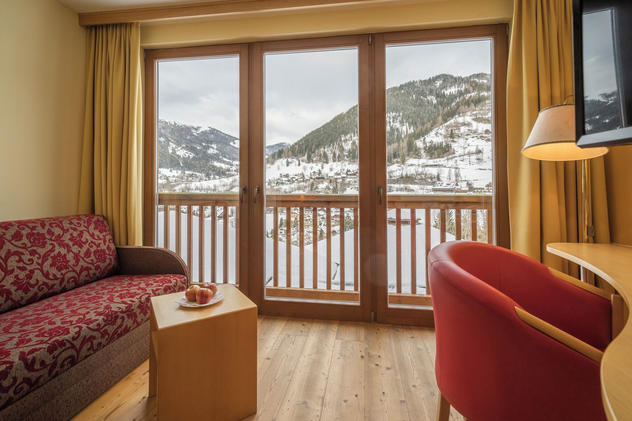 junior studio suite | living area | 50-inch flat-screen tv with satellite channels, ping pong, toys