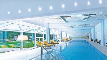 Indoor pool, open 7:00 AM to 9:00 PM, pool loungers