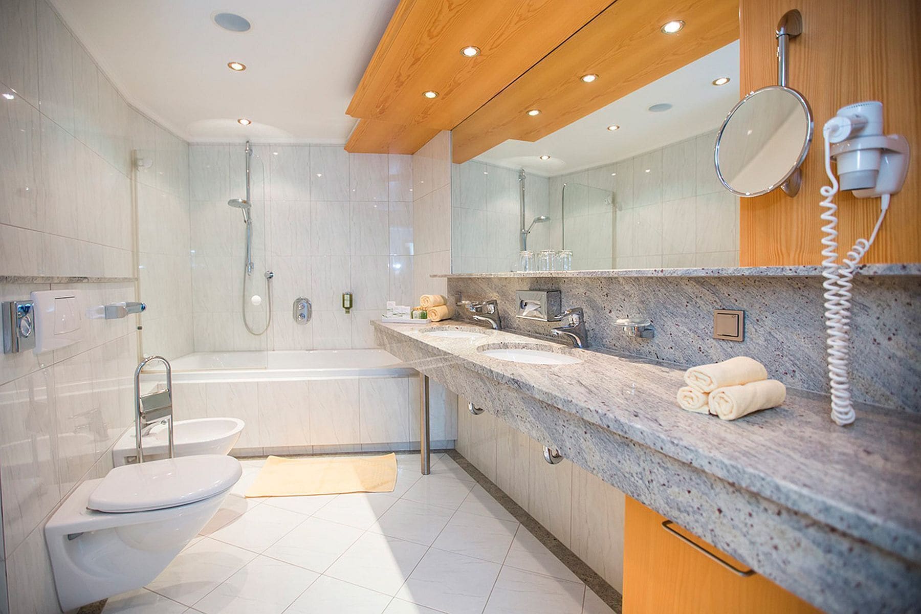 suite alpine prestige | bathroom | free toiletries, hair dryer, bathrobes, slippers