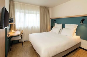 Standardzimmer, 1 Doppelbett, Nichtraucher | Schreibtisch, kostenlose Babybetten, kostenloses WLAN, Bettwäsche