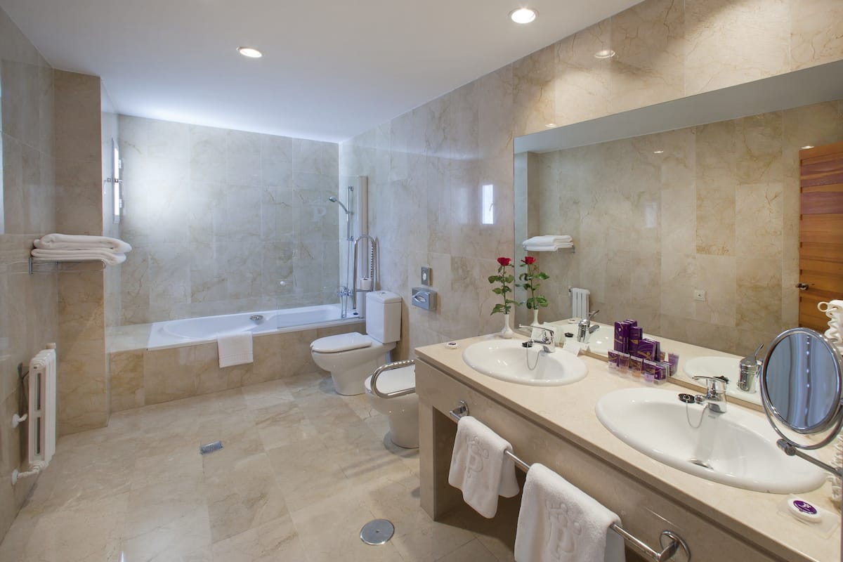 eco-friendly toiletries, hair dryer, bidet, towels