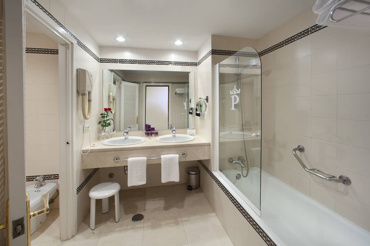 eco-friendly toiletries, hair dryer, bidet, towels