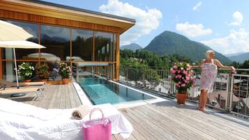 Relax on the deck with lounge chairs and take in the breathtaking mountain views.